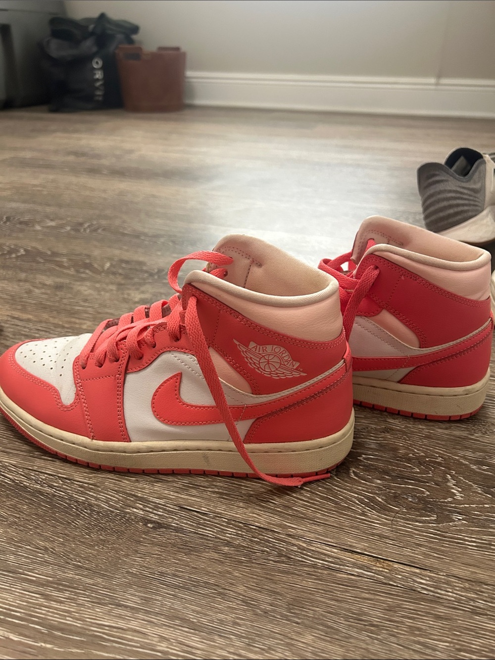 Jordan Women's Mid-Top Sneakers in Coral Pink & White